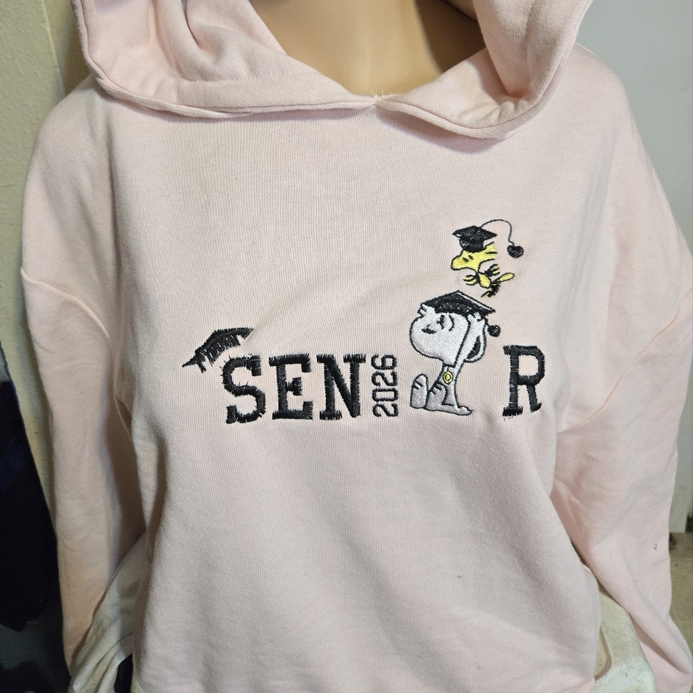 women Snoopy senior sweaterPlease note that the sweater has a minor defect; kind